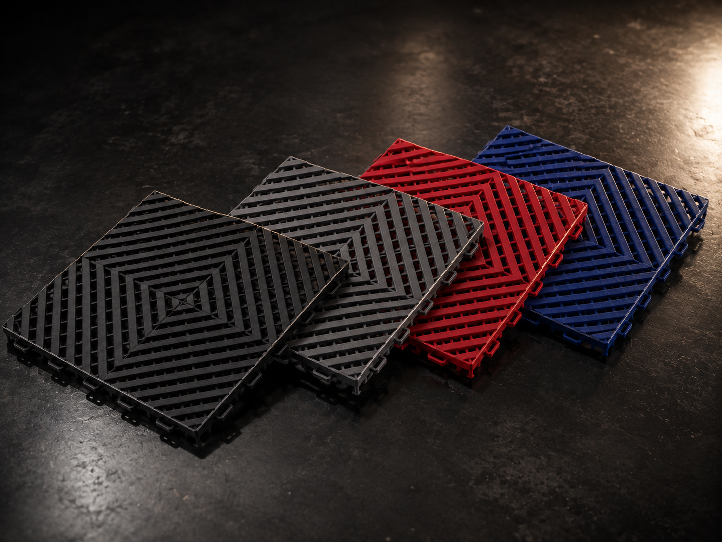 Gama de colores de la loseta CorsaLux Grid: negro, grafito, rojo y azul