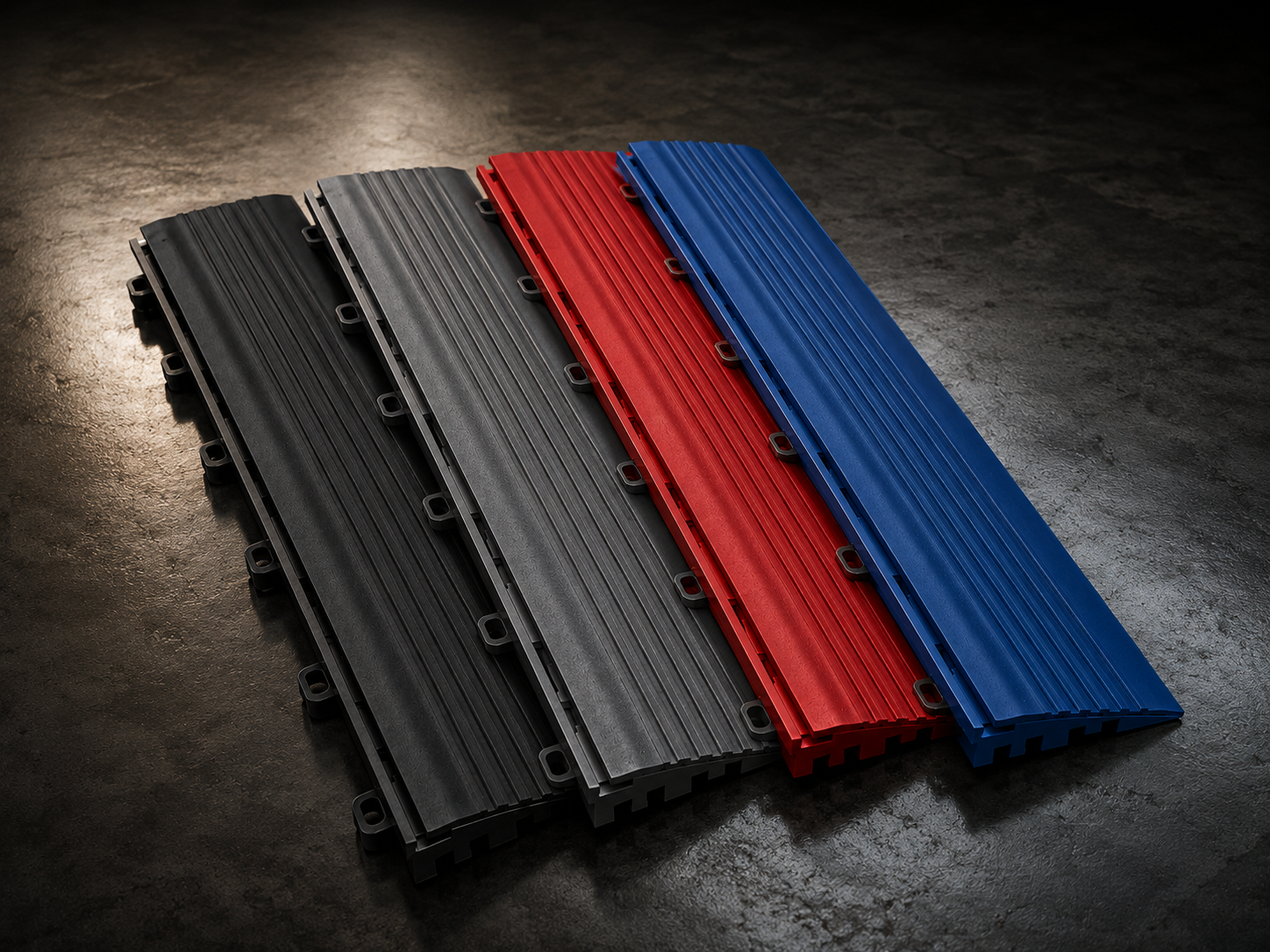Gama de colores de la rampa CorsaLux: negro, gris grafito, rojo y azul